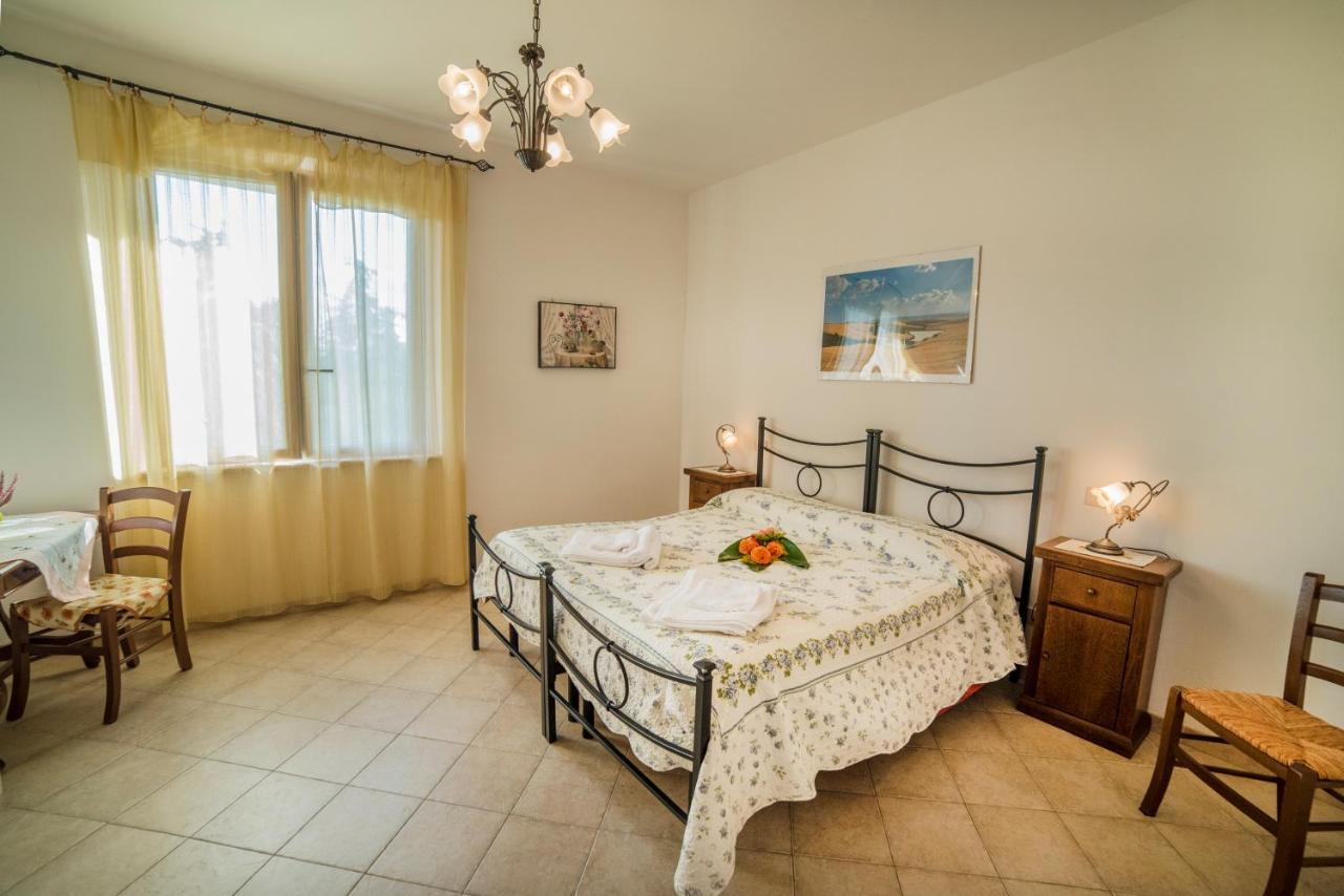 Casa Vacanze Santa Caterina Asciano Exterior photo